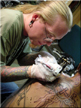 Todd Tattoo Artist tattoing Randy